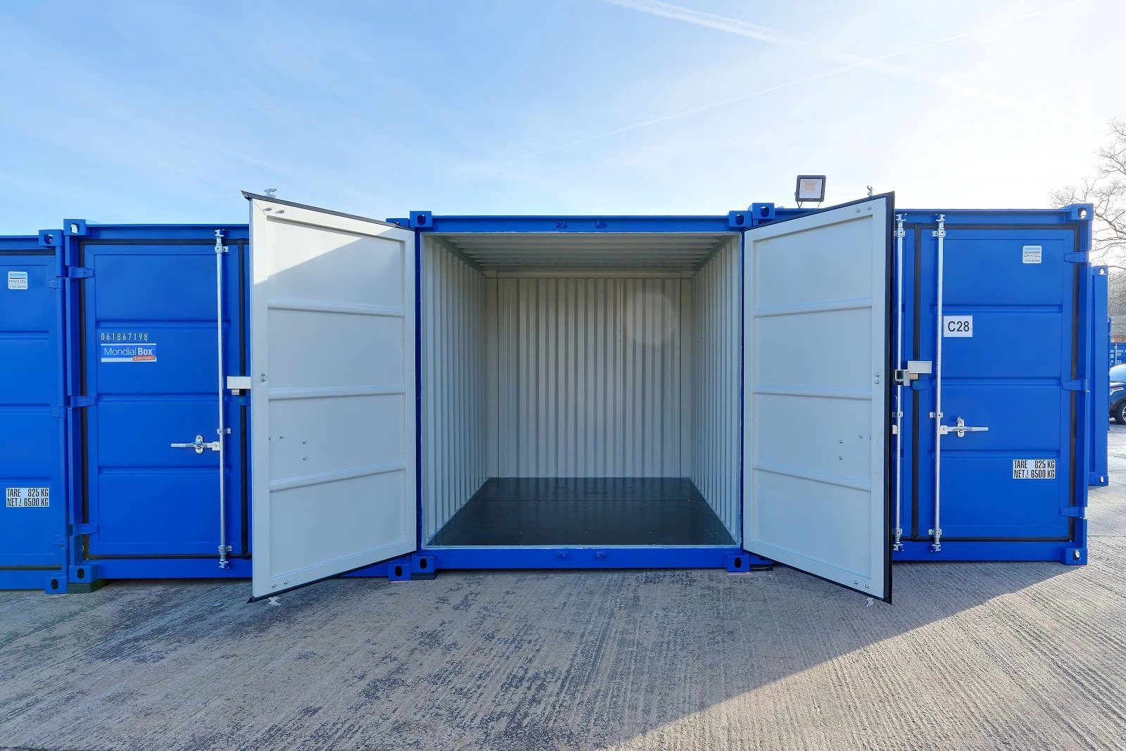 orange and black building under blue sky